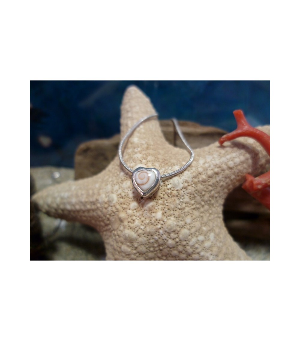 Pendentif argent massif et oeil de Sainte Lucie