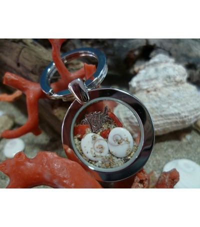 Stainless steel keyring eye of Saint Lucia and red coral