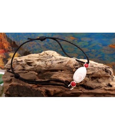 Sterling silver bracelet with red coral and the Eye of Saint Lucia